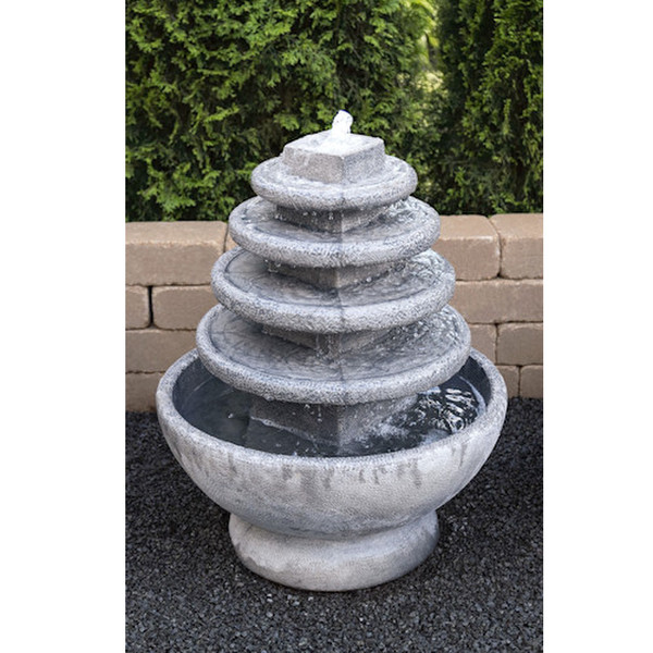 Solstice Fountain with light cast stone round discs flowing waters